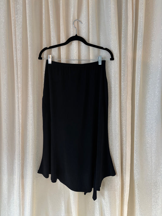 Black asymmetrical midi skirt