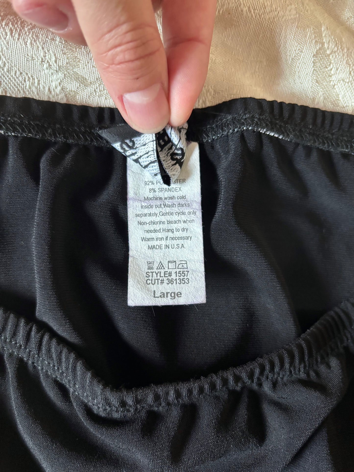 Black asymmetrical midi skirt