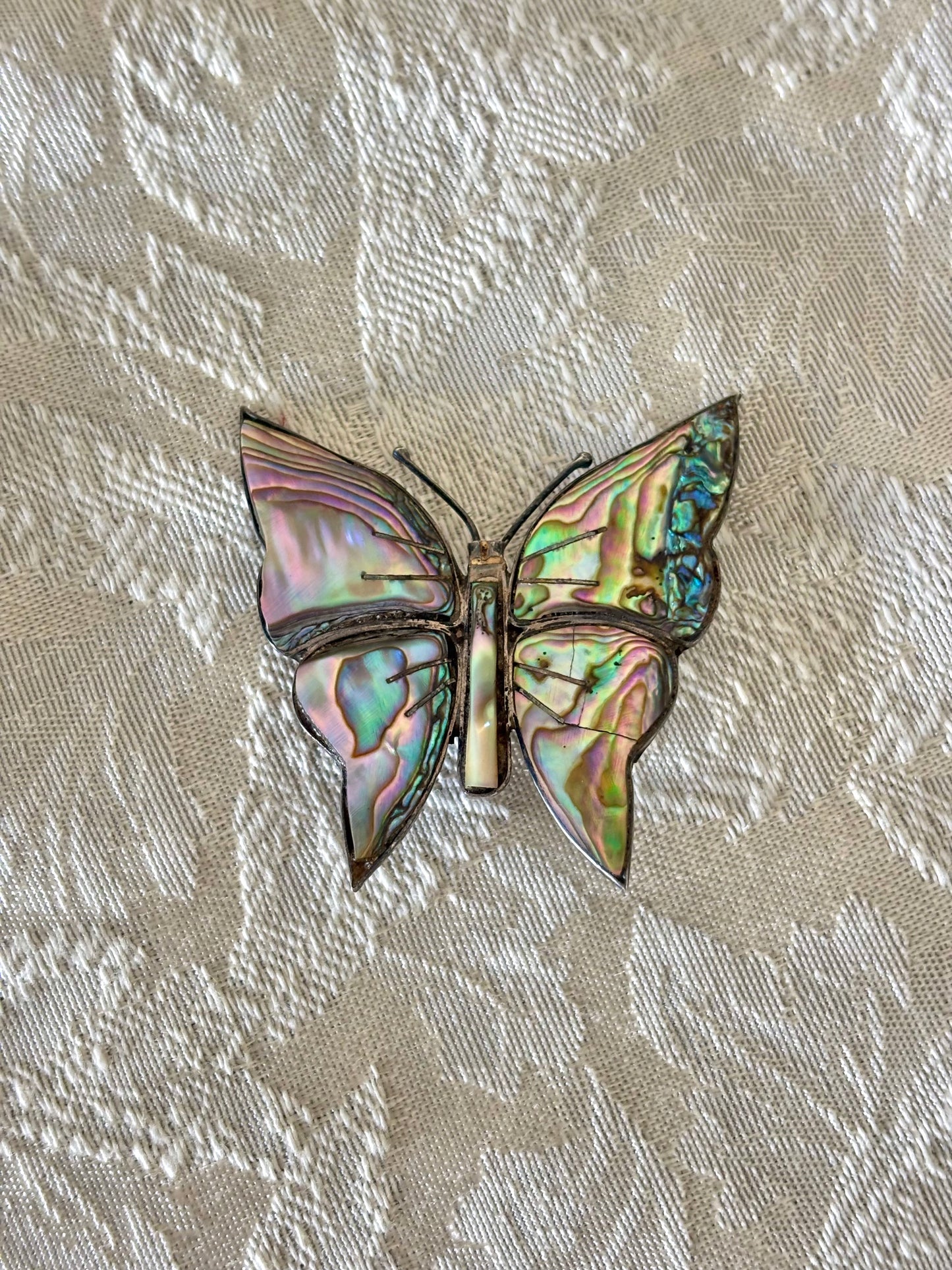 Sterling silver and abalone brooches