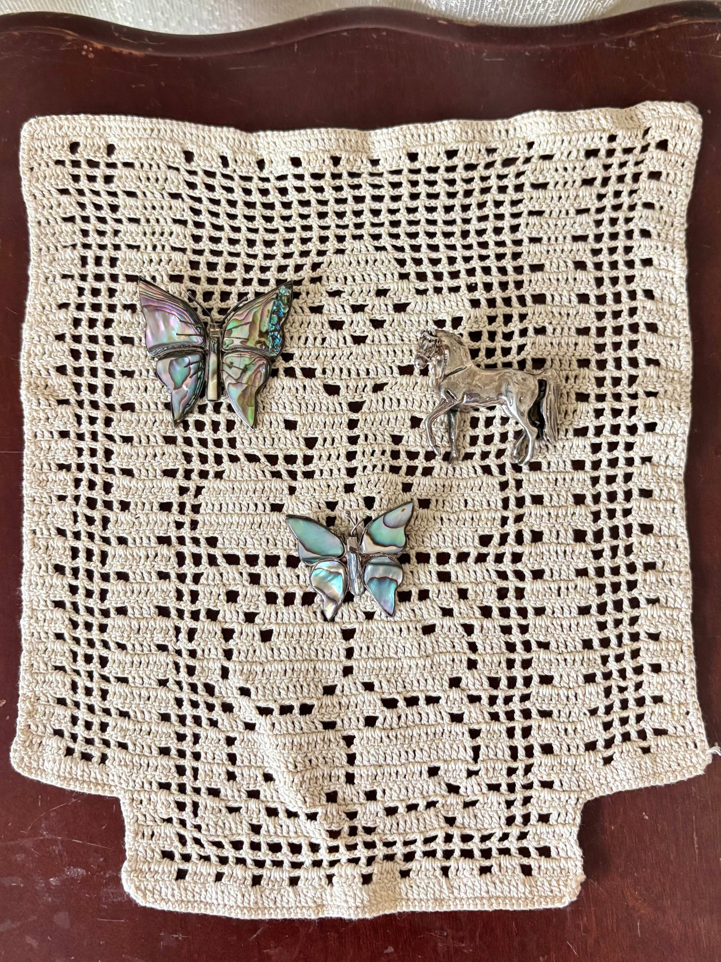 Sterling silver and abalone brooches