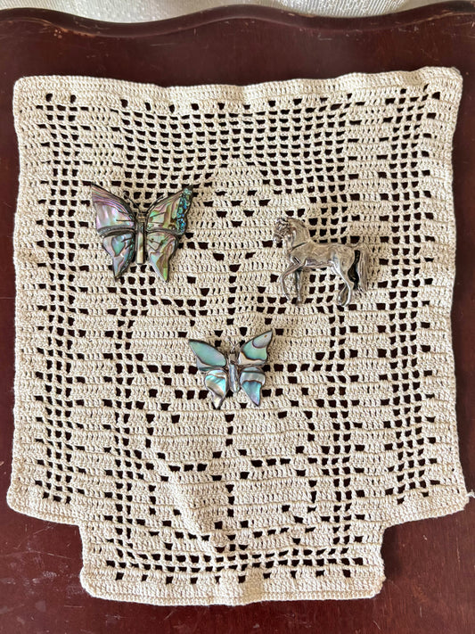 Sterling silver and abalone brooches