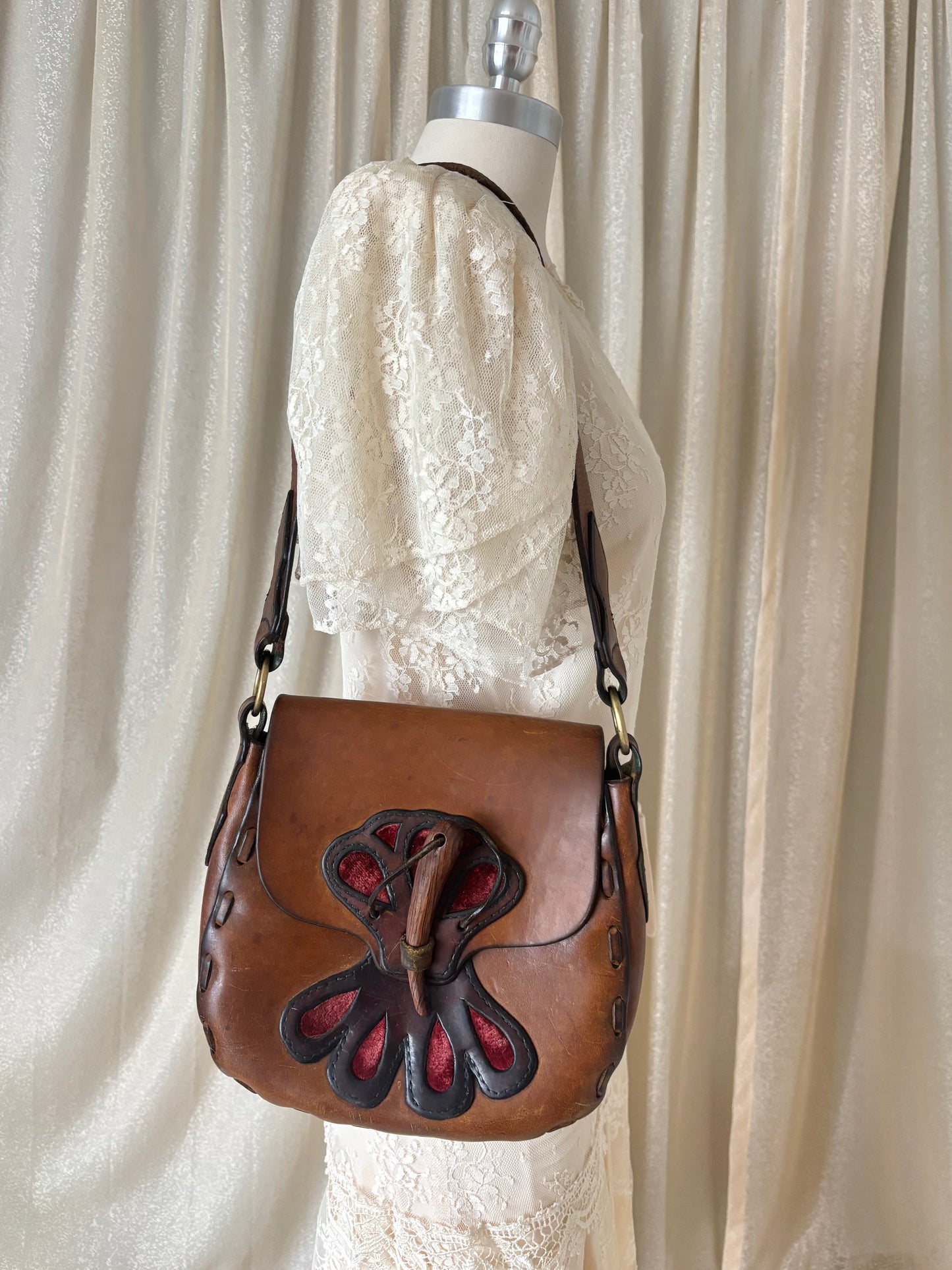 70s leather satchel with velvet cutouts