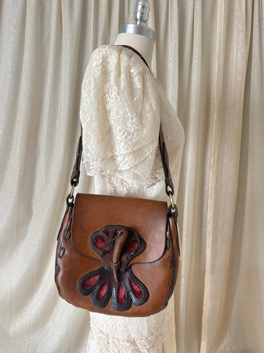 70s leather satchel with velvet cutouts