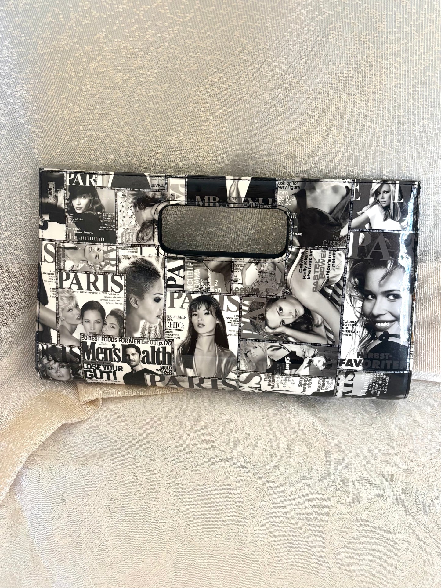 Glossy magazine clutch