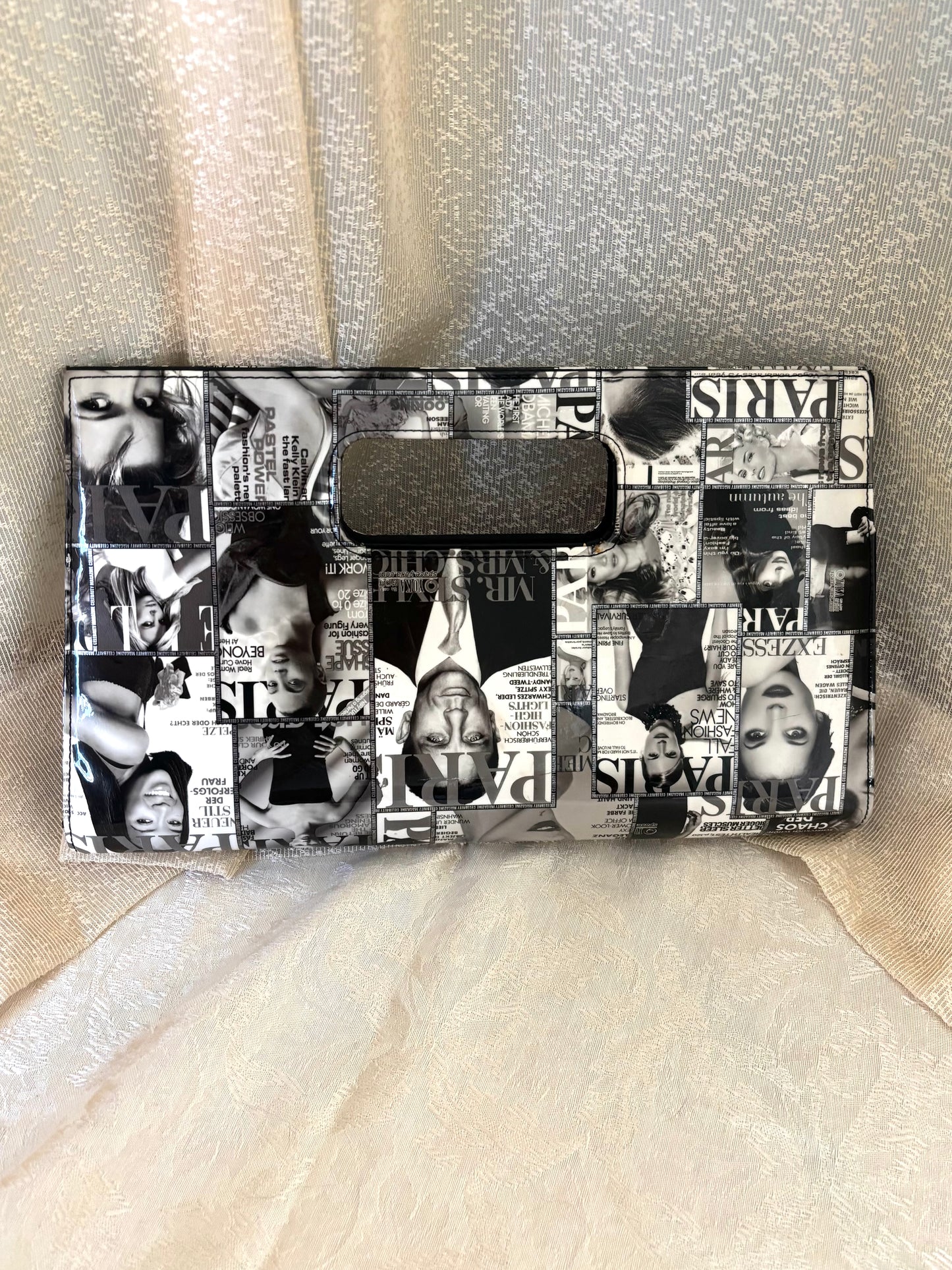 Glossy magazine clutch