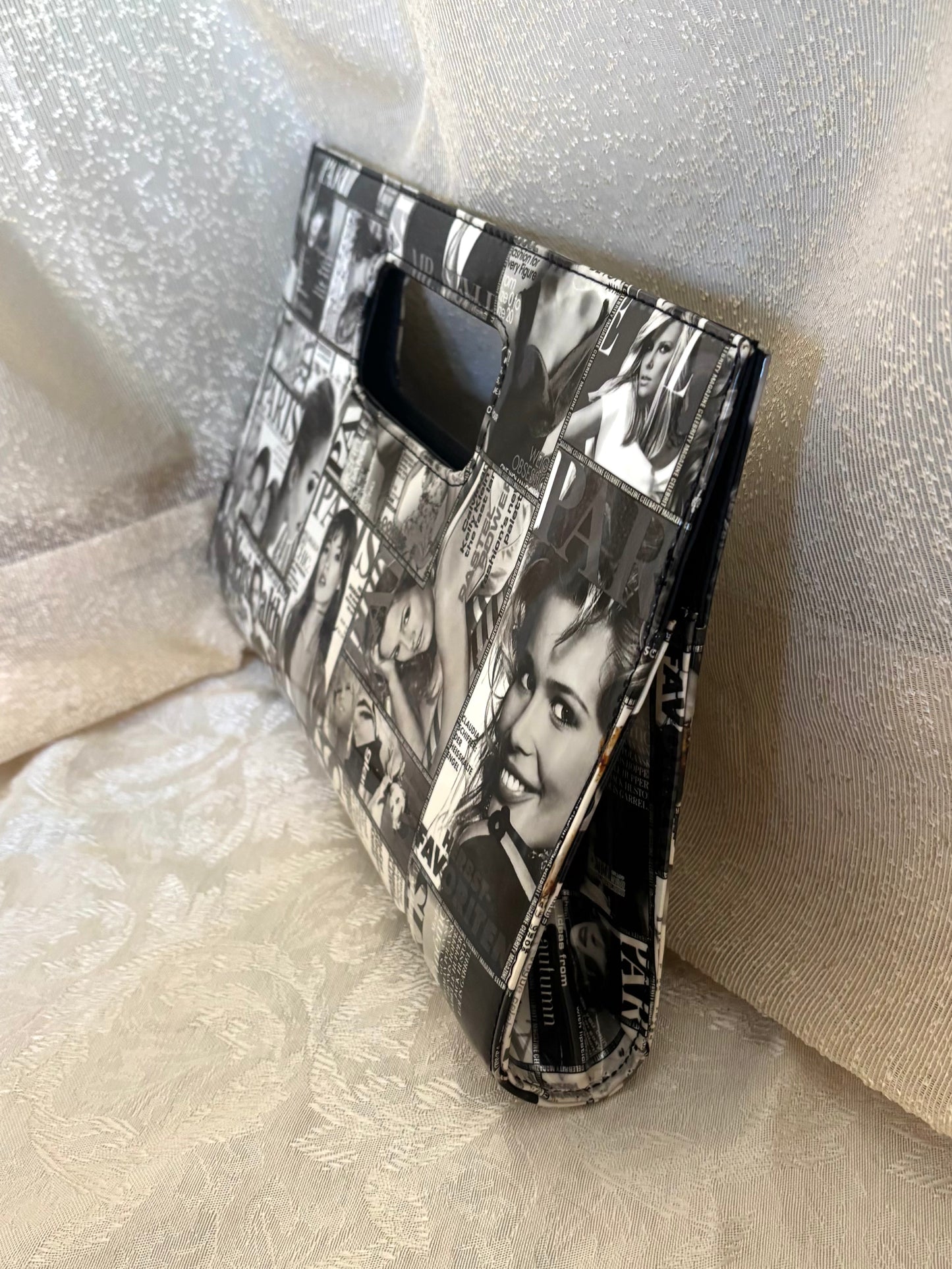 Glossy magazine clutch