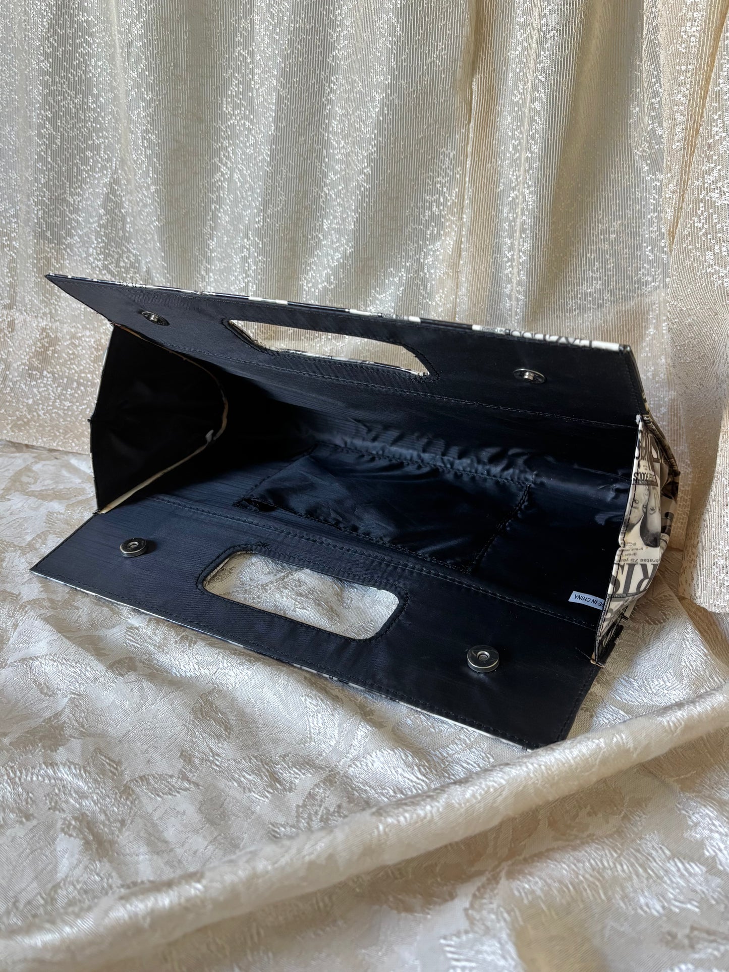 Glossy magazine clutch