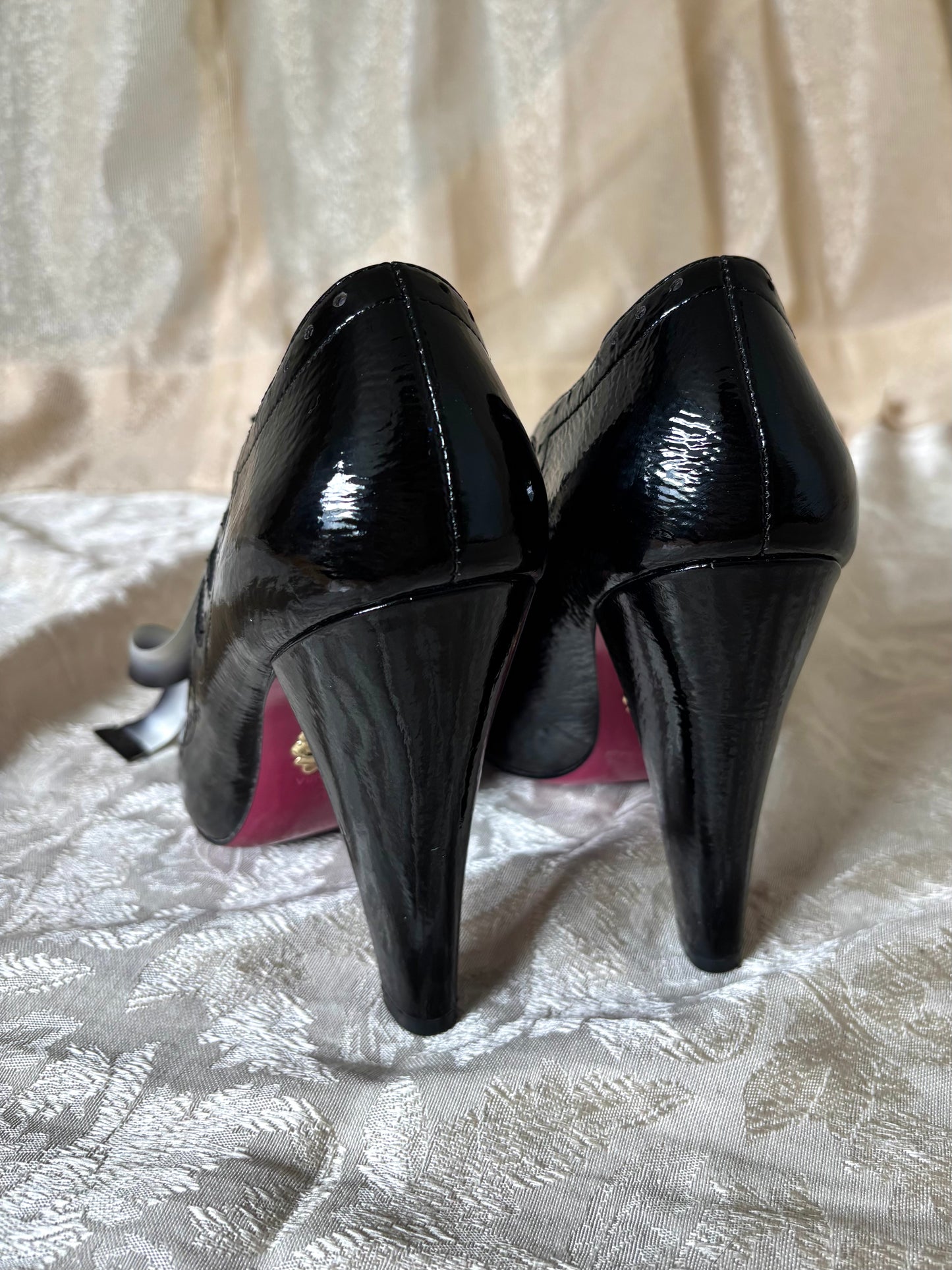 Betsey Johnson patent ribbon pumps