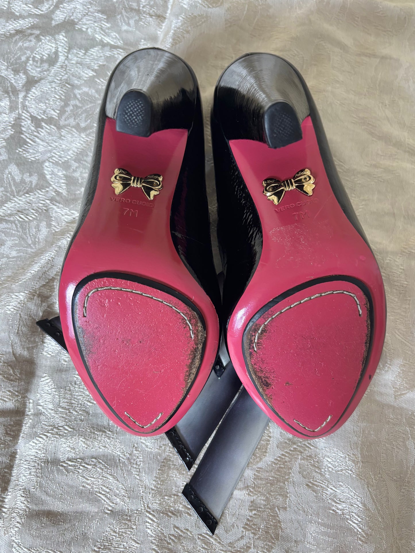 Betsey Johnson patent ribbon pumps