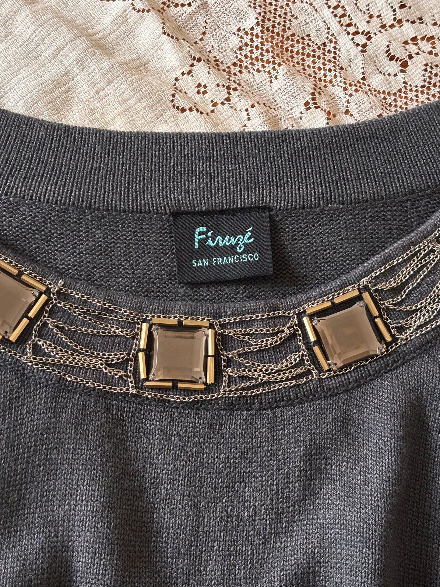 Grey chain embellished knit top