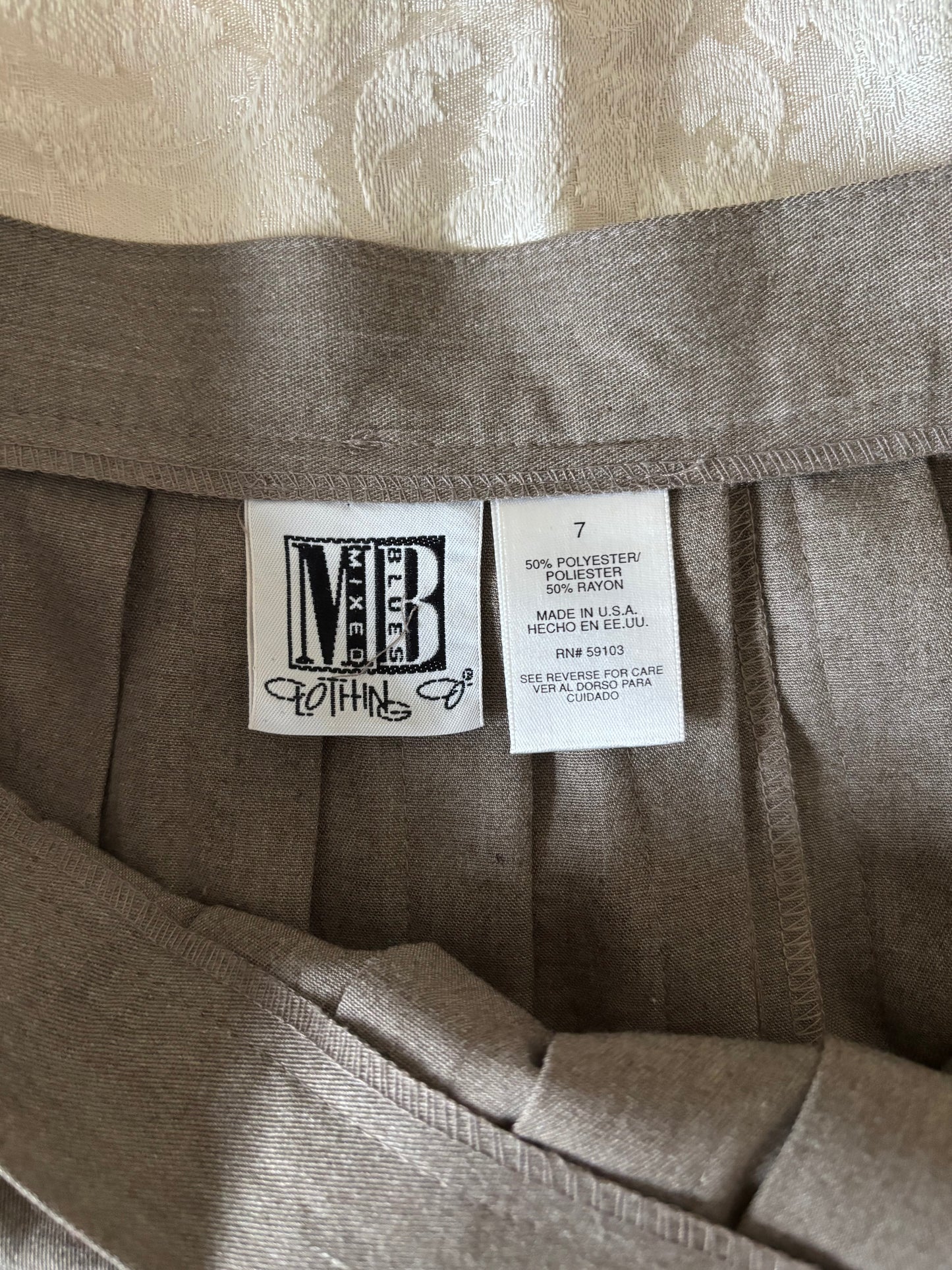 90s tan pleated mini skirt