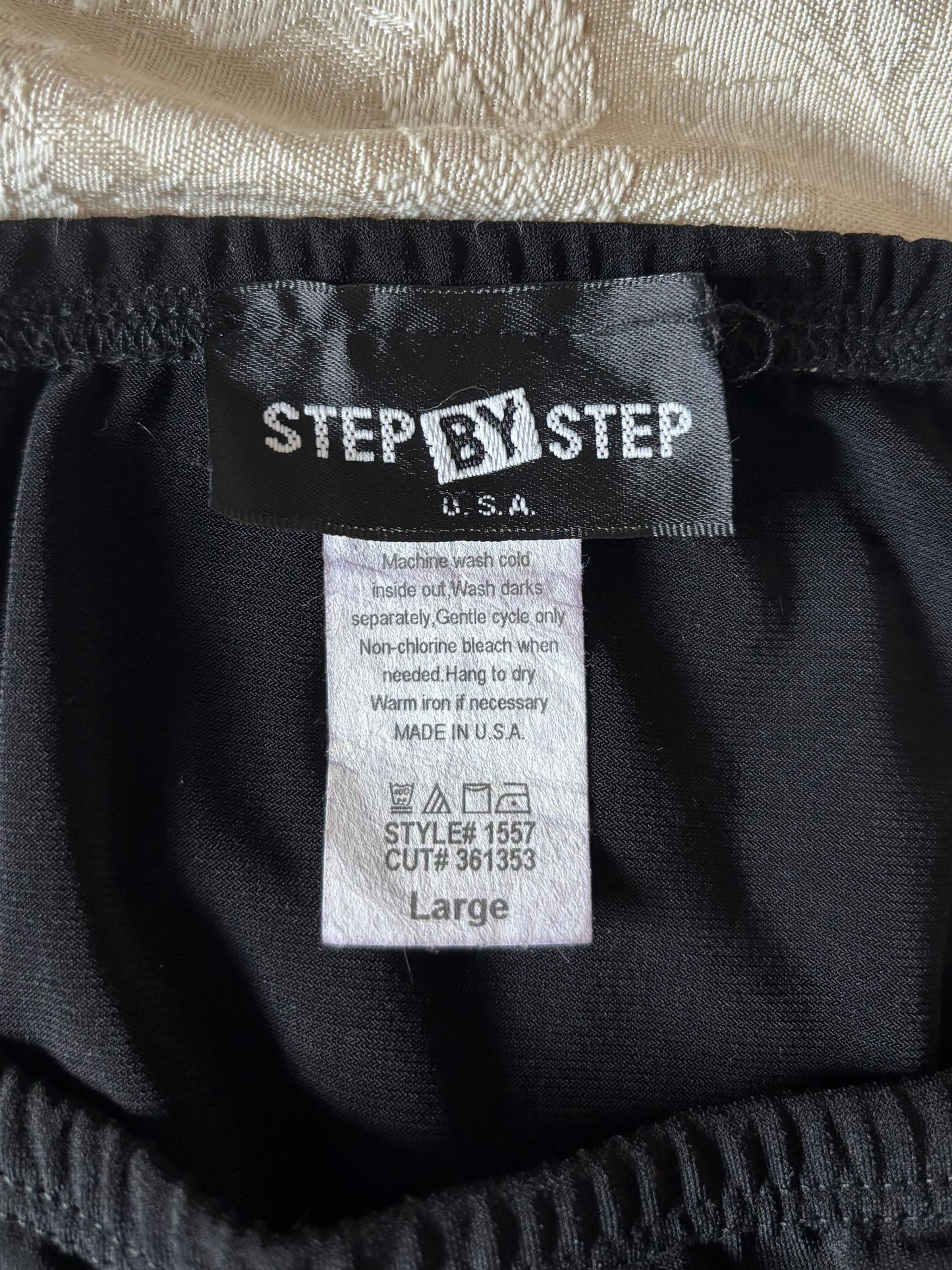 Black asymmetrical midi skirt