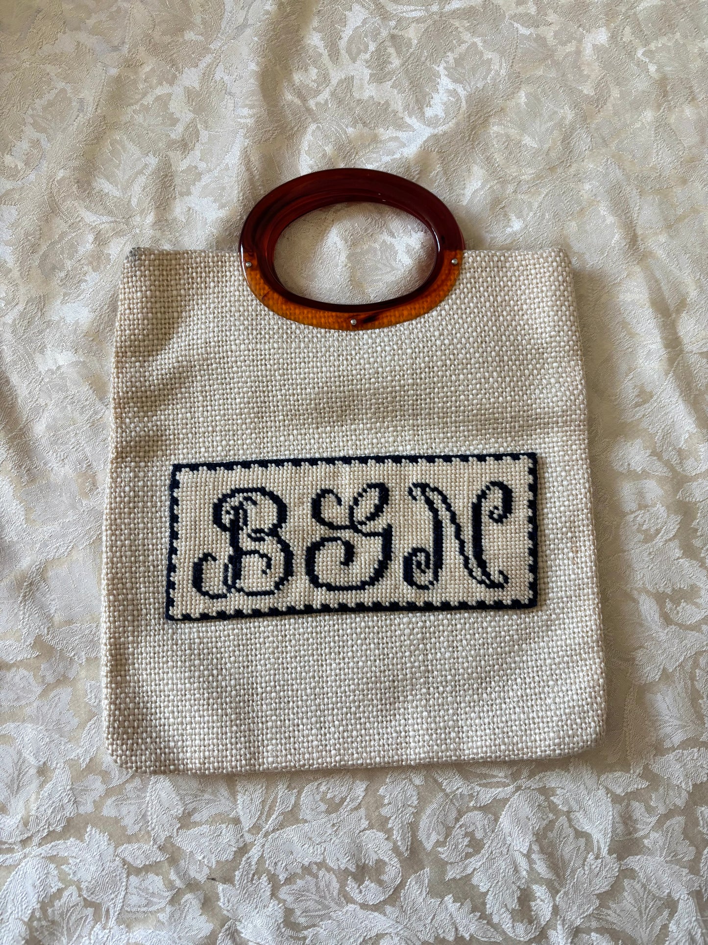 Needlepoint monogram woven bag
