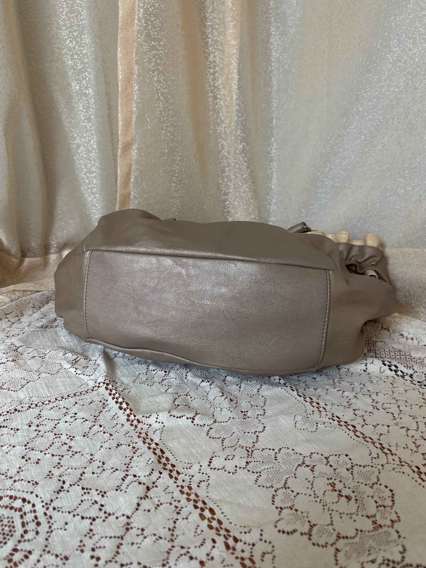 Gold ruffle shoulder bag