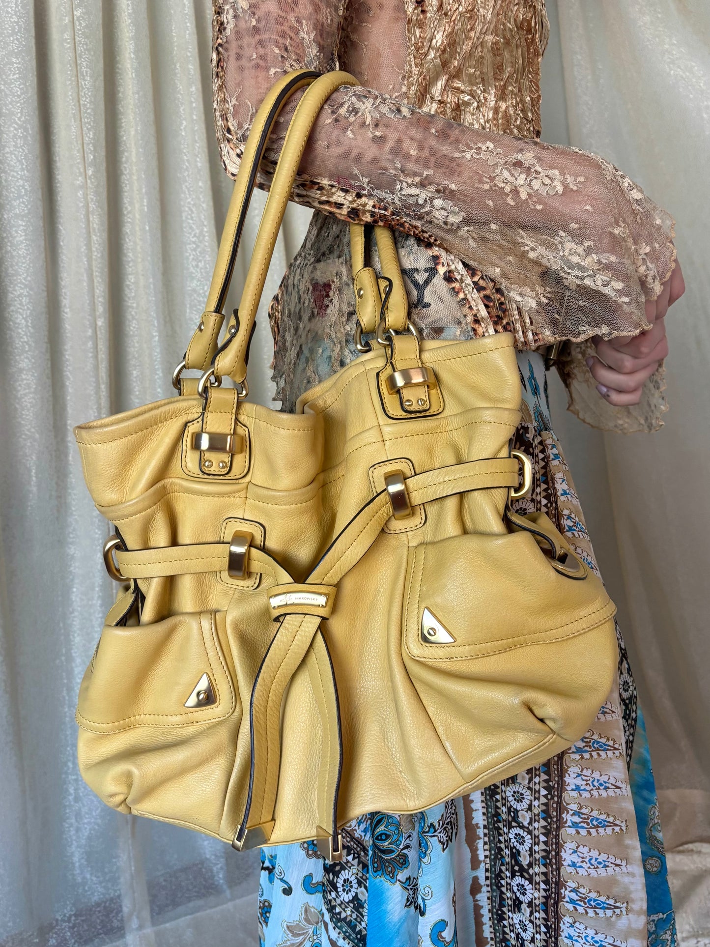 B. Makowsky yellow leather shoulder bag
