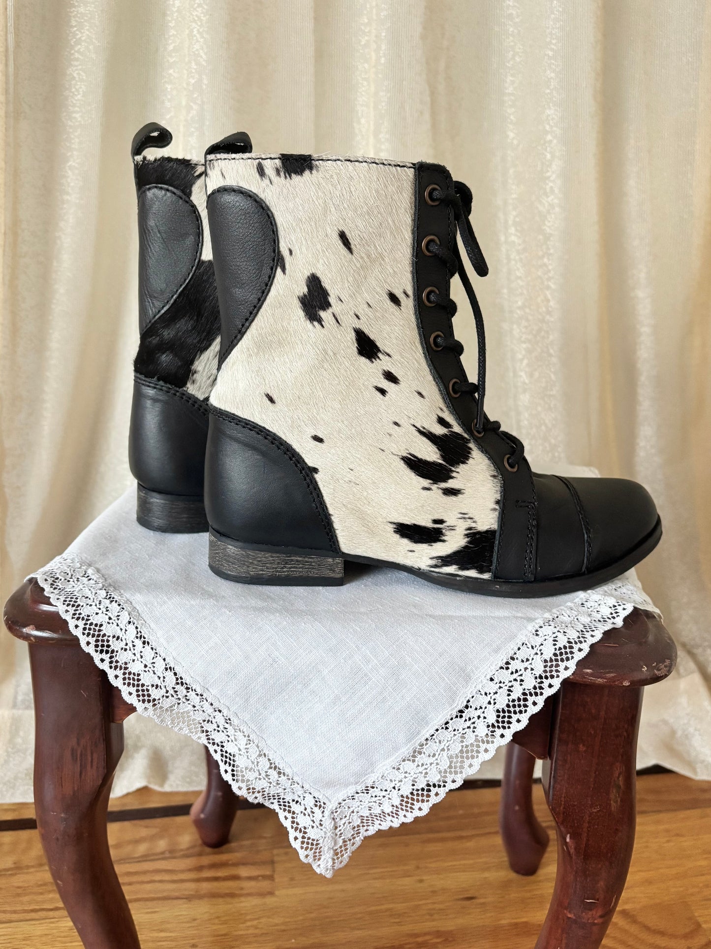 Betsey Johnson calf hair lace up boots